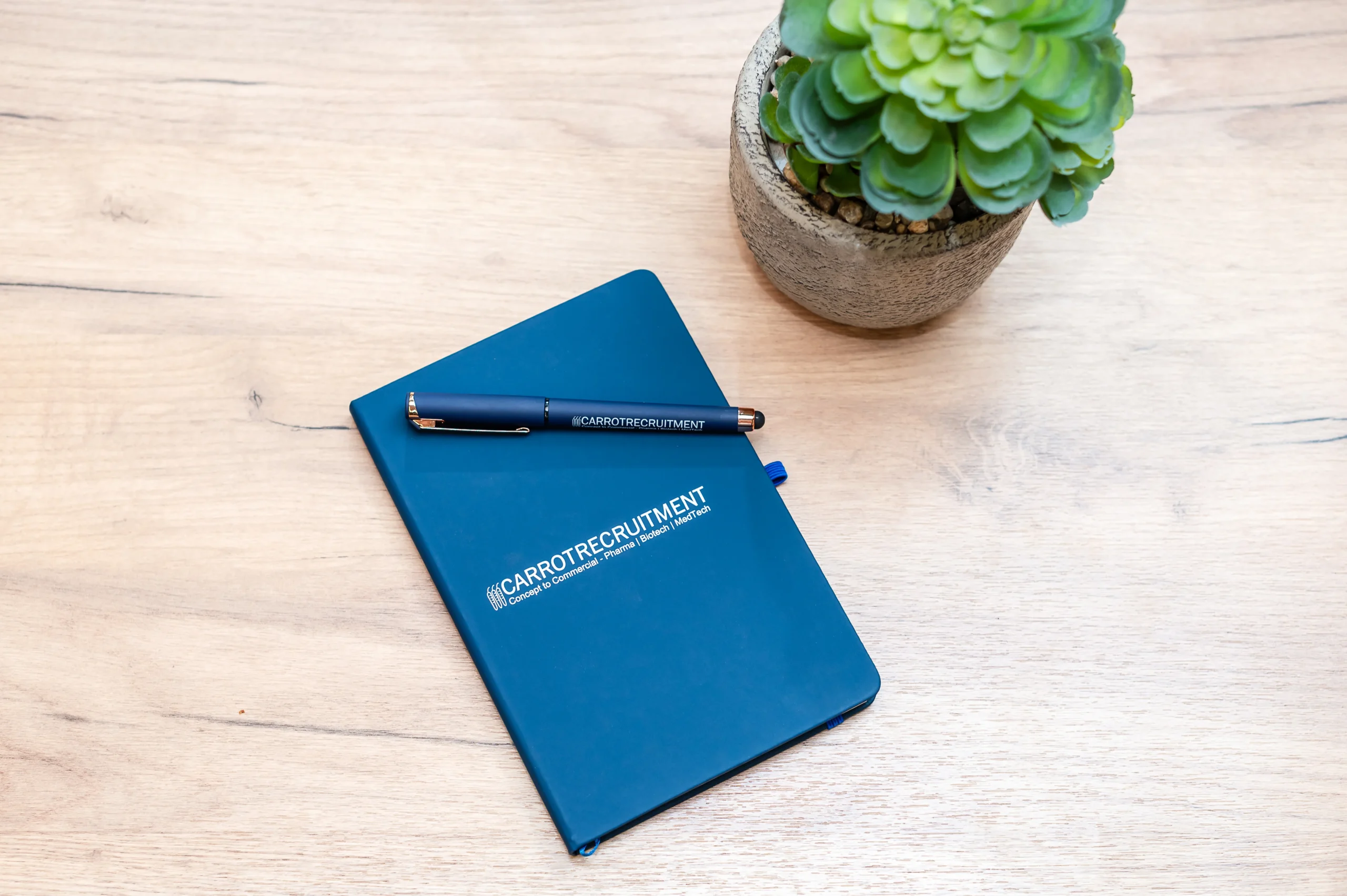 A blue notebook branded with 